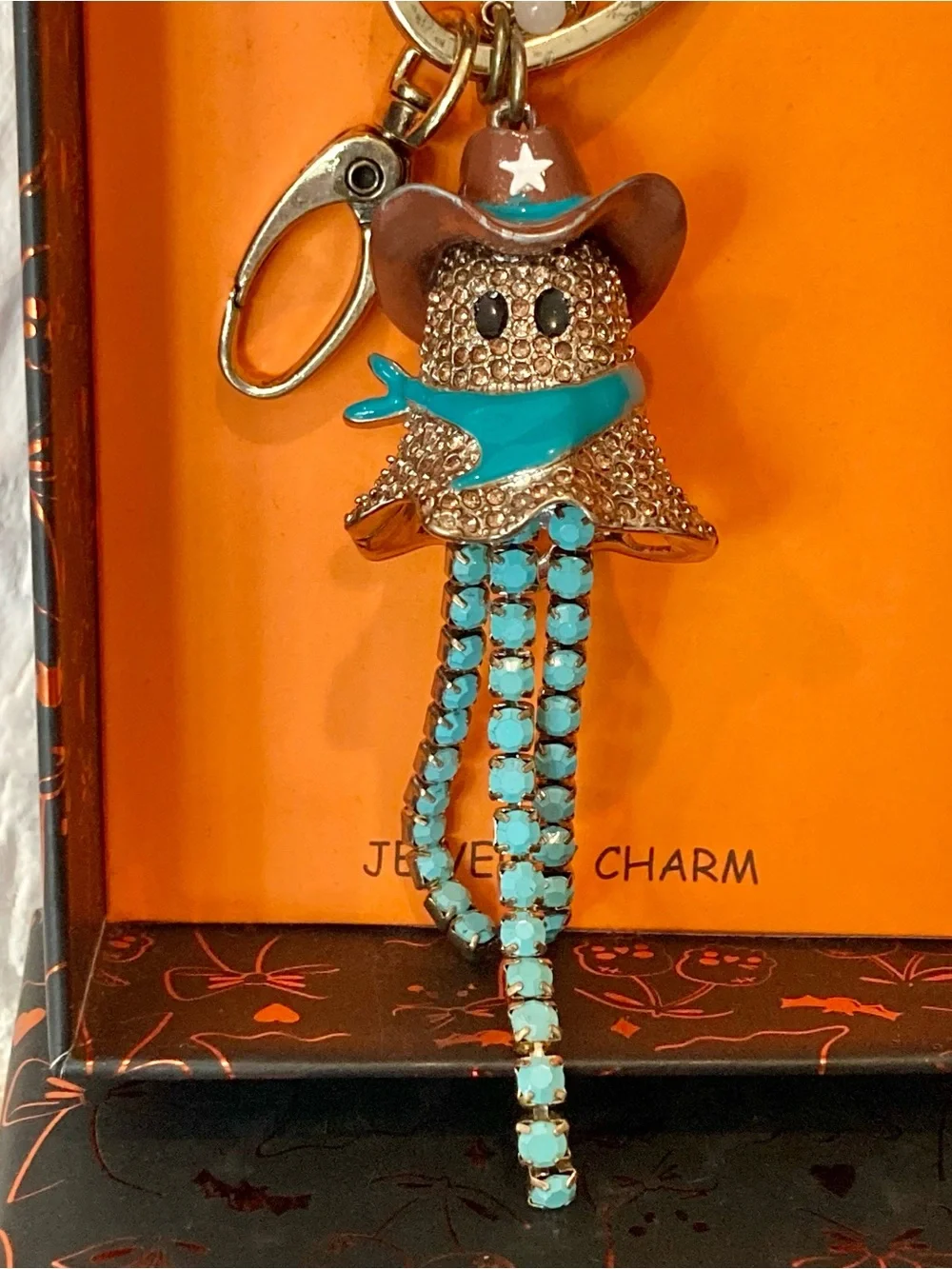 NWT and box Betsey Johnson spooky sheriff cowboy ghost bag charm and keychain.